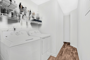 a washer and dryer at Caveness Farms Apartments, North Carolina 